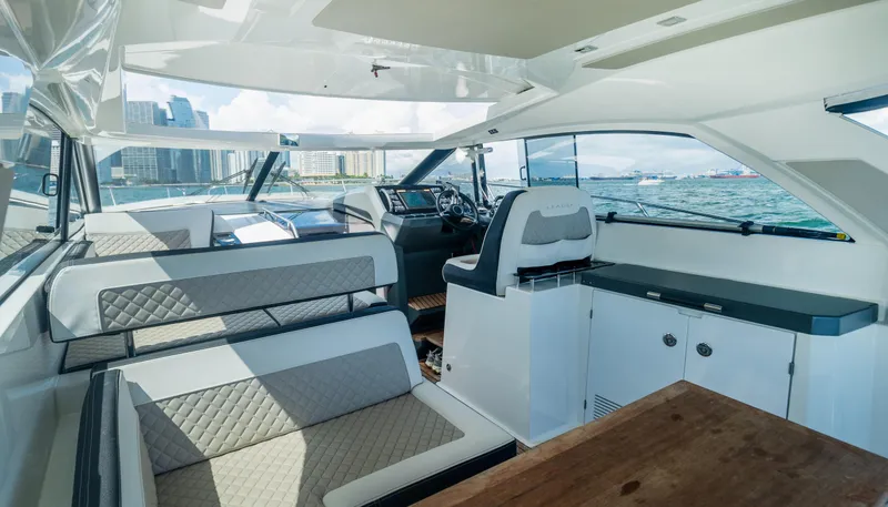 Slide: The Image of Interior of 2019 Jeanneau Leader 40 yacht with modern seating and ocean view. - 37