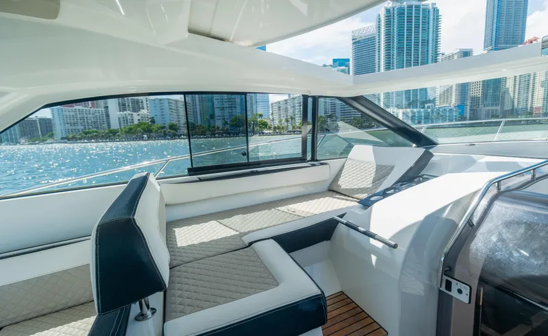 Slide: The Image of Luxurious 2019 Jeanneau Leader 40 yacht interior with city skyline view. - 42