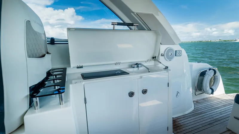 Slide: The Image of Outdoor kitchenette on 2019 Jeanneau Leader 40 yacht with ocean view. - 44