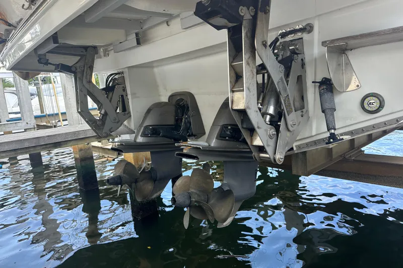 Slide: The Image of Stern view of 2019 Jeanneau Leader 40 boat with dual propellers in water. - 74