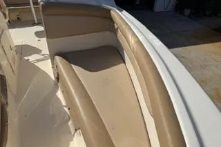 Slide: The Image of 2020 Scout 215 Dorado boat interior with beige seating and white trim. - 15
