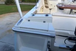 Slide: The Image of 2020 Scout 215 Dorado boat interior with seating and storage compartments. - 7