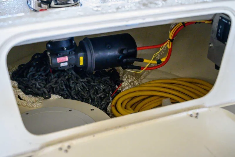 Slide: The Image of Storage compartment in 2020 Targa 32 boat with chains and cables. - 12