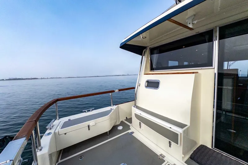 Slide: The Image of 2020 Targa 32 boat deck with ocean view, featuring sleek design and modern amenities. - 3