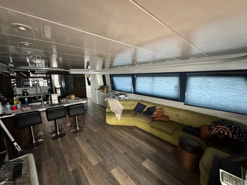 Slide: The Image of Luxurious interior of 1990 Versilcraft Challenger Motor Yacht with modern furnishings and spacious layout. - 12