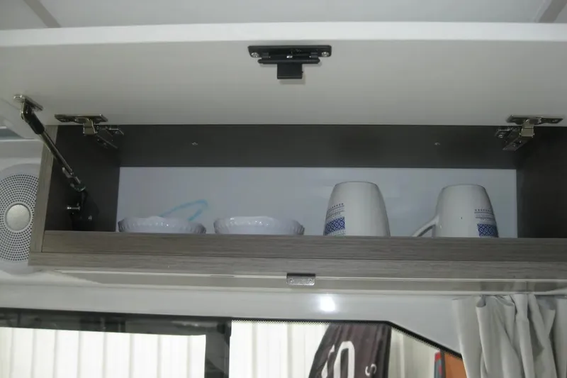 Slide: The Image of Garmin marine radio and speaker on 2026 Jeanneau NC 895 Series 2 boat. - 37