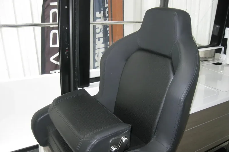 Slide: The Image of 2026 Jeanneau NC 895 Series 2 boat seating, featuring sleek gray cushions. - 40