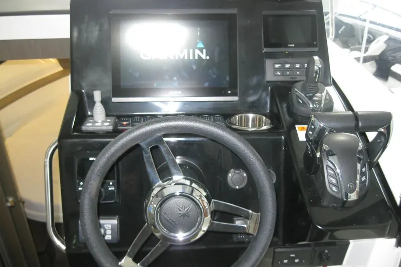 Slide: The Image of 2026 Jeanneau NC 895 Series 2 boat with people paddleboarding in tropical waters. - 41