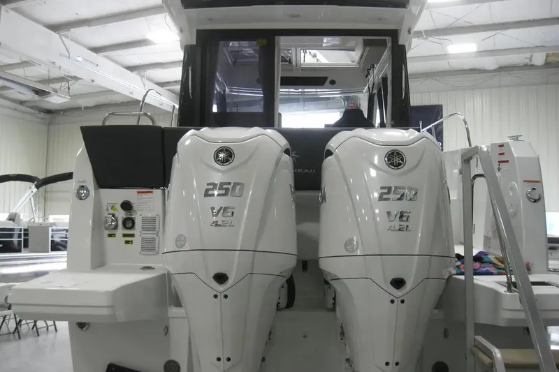 Slide: The Image of Chrome "NC" emblem on Jeanneau NC 895 Series 2, 2026 model boat. - 6