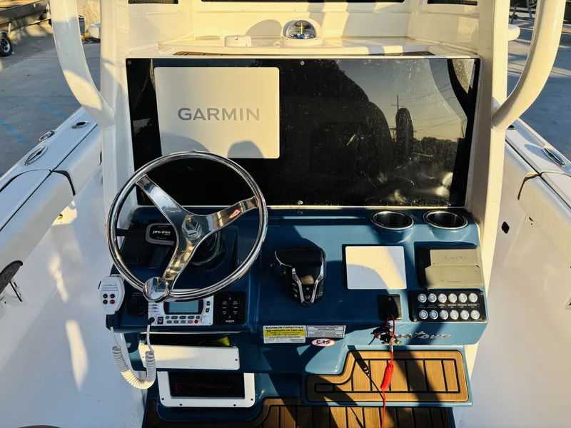 Slide: The Image of 2024 Tidewater Custom 22 Excursion CC helm with Garmin display. - 8