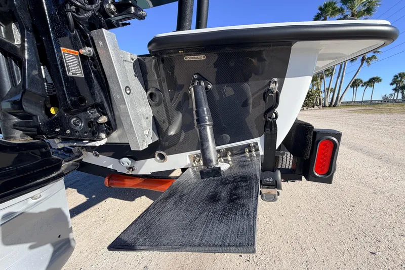 Slide: The Image of 2021 Chittum Skiffs Islamorada 18 boat transom with trim tab and motor mount. - 13