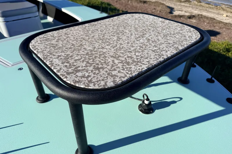 Slide: The Image of Chittum Skiffs Islamorada 18, 2021 model, featuring a textured platform on a light blue deck. - 27