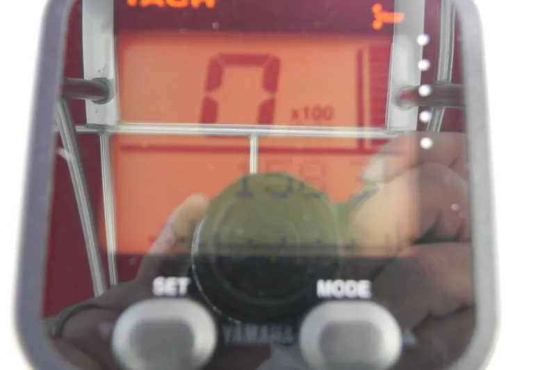 Slide: The Image of Close-up of a Yamaha tachometer on a 2014 Parker 1801 Center Console boat. - 4