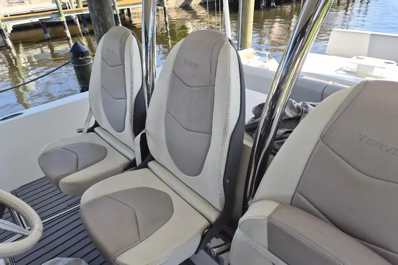 Slide: The Image of Luxury seating on a 2013 Azimut 36 yacht, featuring elegant design and waterfront view. - 14