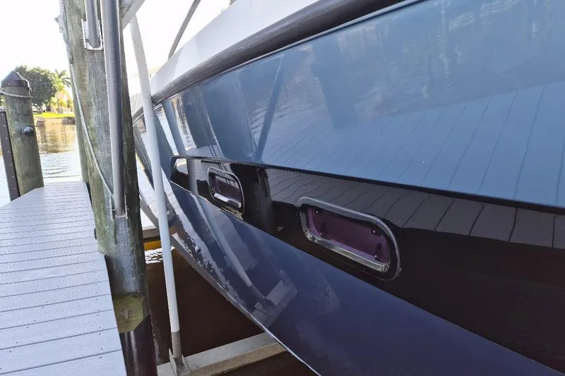 Slide: The Image of Azimut 36 yacht from 2013 docked, showcasing sleek design and modern features. - 5