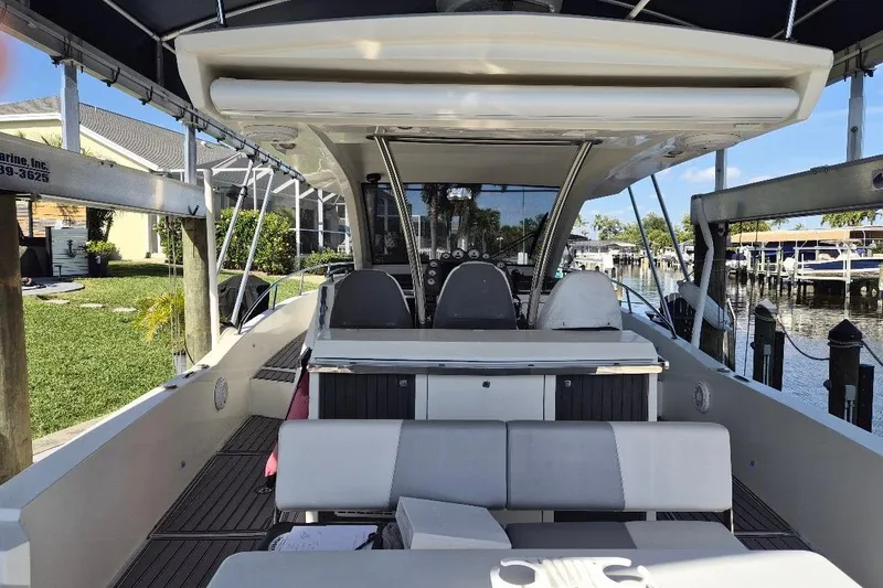 Slide: The Image of Azimut 36 yacht, 2013 model, docked with spacious seating and modern design. - 7