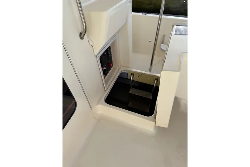 Slide: The Image of Bathroom interior of 2006 Mainship 34 Trawler with sink and toilet. - 27