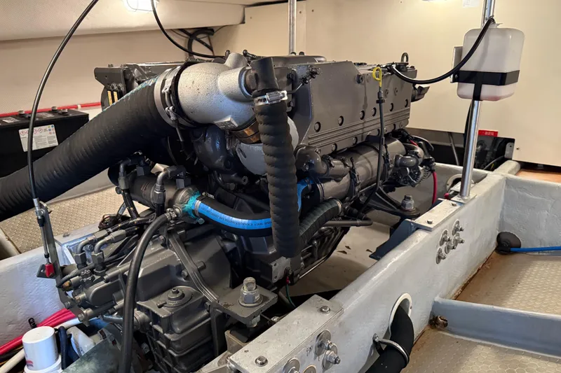 Slide: The Image of Close-up of a Faria tachometer showing 1485.8 RPM on a 2006 Mainship 34 Trawler. - 32