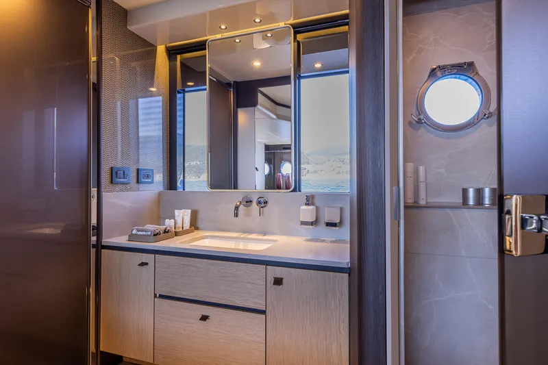 Slide: The Image of Luxurious bathroom interior of 2025 Absolute 56 FLY yacht with modern fixtures. - 29