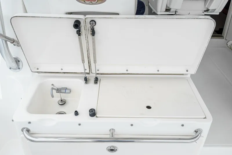 Slide: The Image of 2008 Boston Whaler 345 Conquest boat sink and prep station. - 29