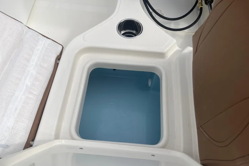 Slide: The Image of Livewell compartment on 2026 Pioneer 180 Sportfish boat, featuring sleek design and functionality. - 21