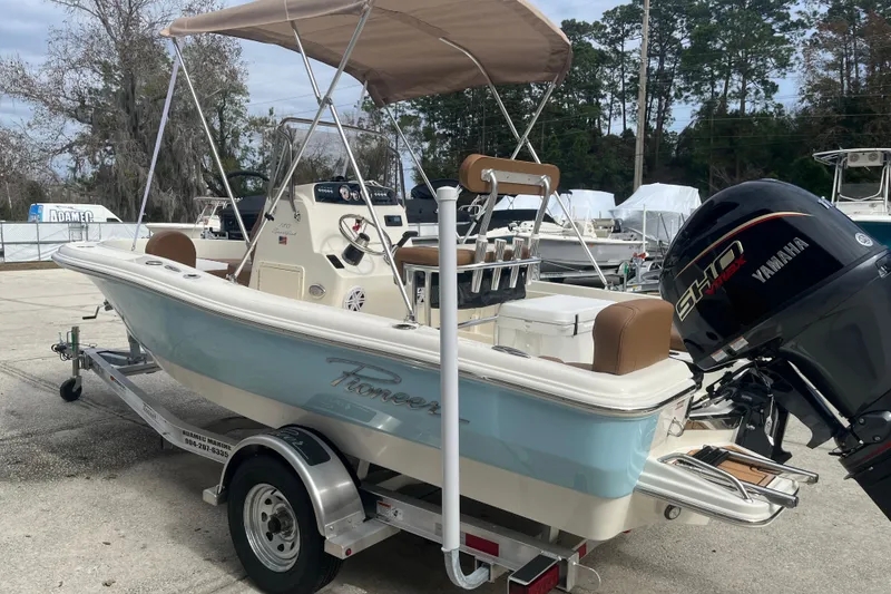Slide: The Image of 2026 Pioneer 180 Sportfish boat with Yamaha engine on trailer. - 5