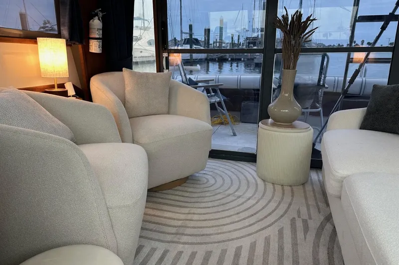 Slide: The Image of Cozy interior of 1989 Tiara Yachts 3100 Flybridge with elegant seating and decor. - 2