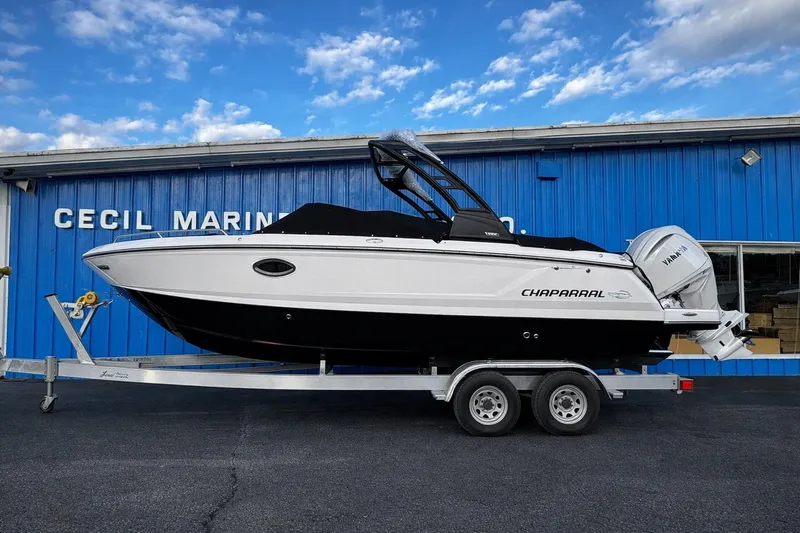 The Image of 2026 Chaparral 250 OSX boat on trailer at Cecil Marine dealership. - 0