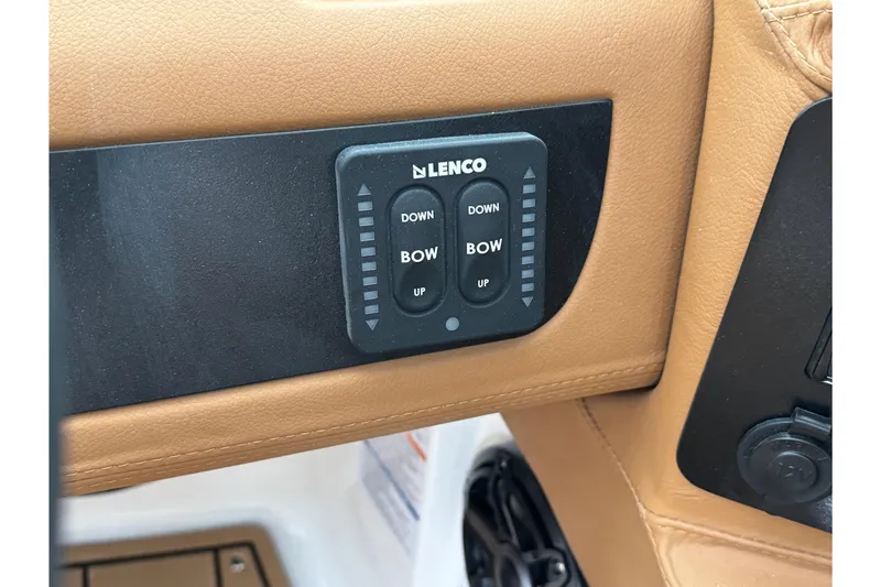 Slide: The Image of Lenco control panel on 2026 Chaparral 250 OSX boat dashboard. - 26