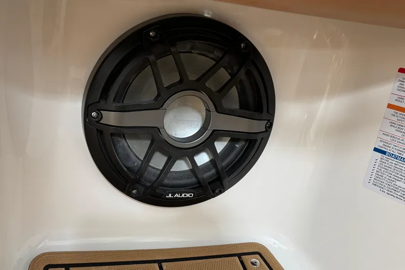 Slide: The Image of JL Audio speaker on 2026 Chaparral 250 OSX boat interior. - 28