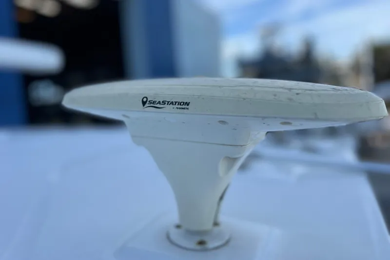 Slide: The Image of Close-up of a Seastation device on a 2022 Blackfin 272 DC boat. - 100