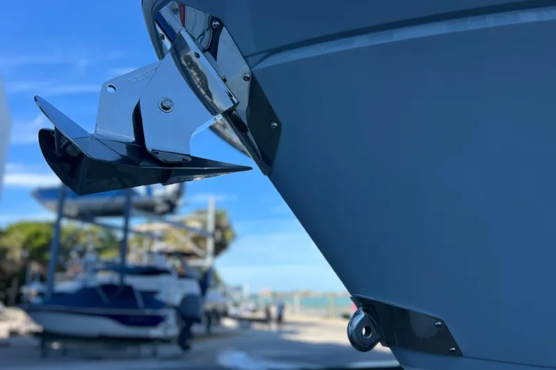 Slide: The Image of Close-up of 2022 Blackfin 272 DC boat anchor against a clear blue sky. - 26