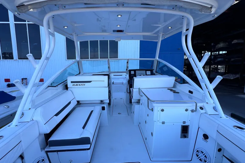 Slide: The Image of 2022 Blackfin 272 DC boat interior with seating and helm station. - 44