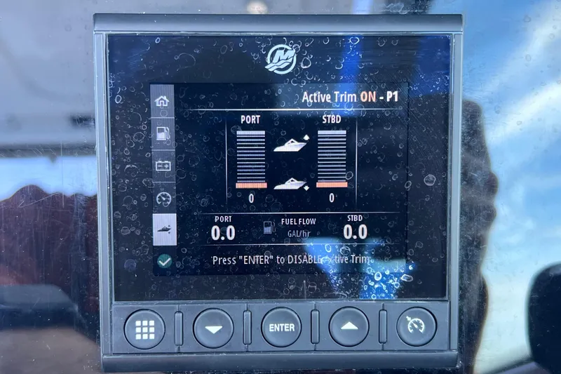 Slide: The Image of Display screen of a 2022 Blackfin 272 DC boat showing active trim settings. - 71