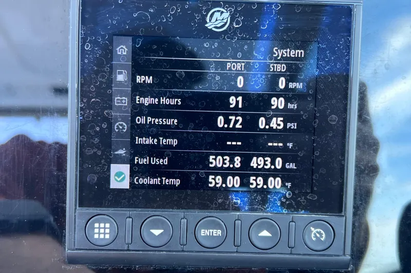 Slide: The Image of Display screen of a 2022 Blackfin 272 DC showing engine metrics and fuel usage. - 72