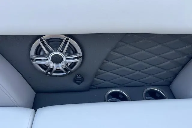 Slide: The Image of 2026 Godfrey Monaco 235 SFLC interior with speaker and cup holders. - 12