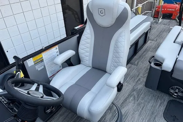 Slide: The Image of Captain's chair on 2026 Godfrey Monaco 235 SFLC pontoon boat, featuring sleek design and comfort. - 20