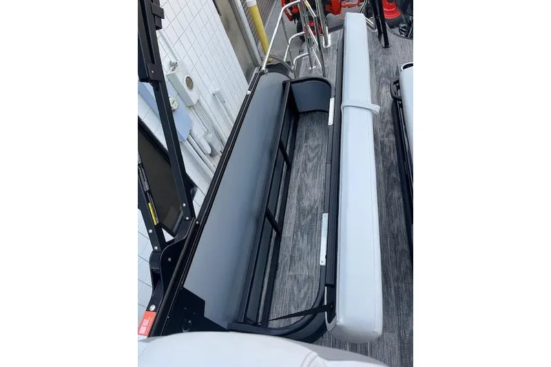 Slide: The Image of 2026 Godfrey Monaco 235 SFLC boat interior seating with modern design and sleek upholstery. - 24