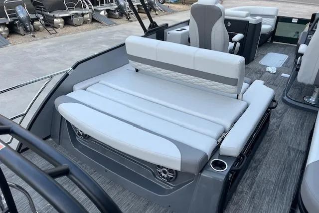 Slide: The Image of 2026 Godfrey Monaco 235 SFLC boat interior with gray seating and modern design. - 26