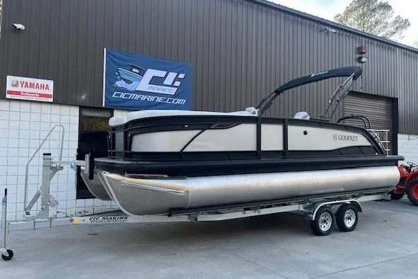 Slide: The Image of 2026 Godfrey Monaco 235 SFLC pontoon boat on trailer outside dealership. - 3