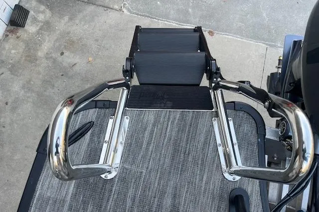 Slide: The Image of Boarding ladder on 2026 Godfrey Monaco 235 SFLC pontoon boat, featuring stainless steel rails. - 36