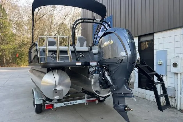 Slide: The Image of 2026 Godfrey Monaco 235 SFLC pontoon boat with Yamaha outboard motor on trailer. - 5