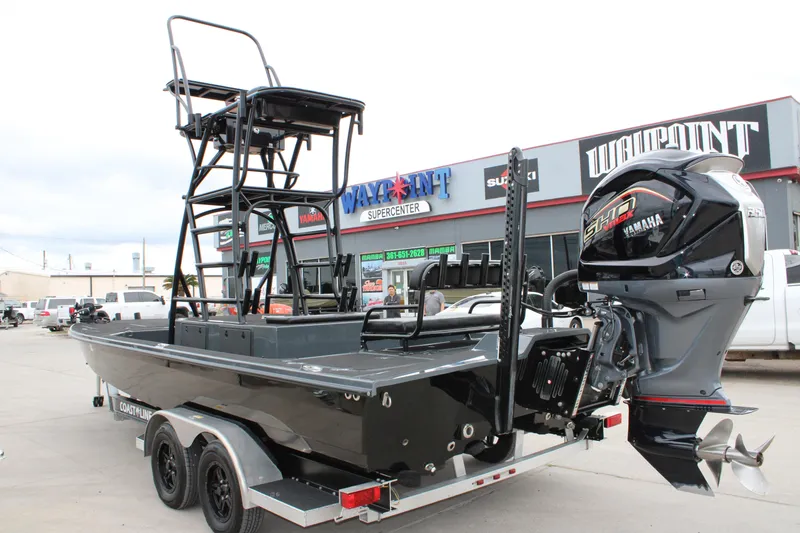 Slide: The Image of 2025 Mamba 24 Catamaran Elite with Yamaha SHO VMAX engine at dealership. - 16