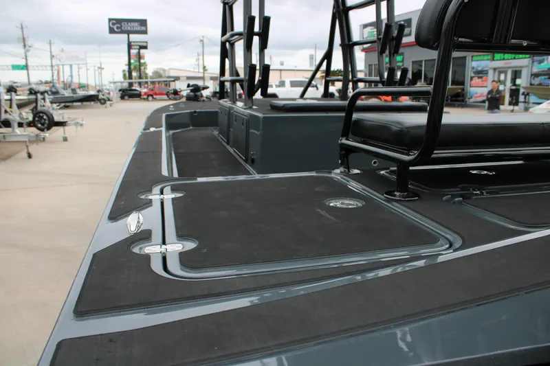 Slide: The Image of 2025 Mamba 24 Catamaran Elite on trailer at Waypoint Marine dealership. - 21