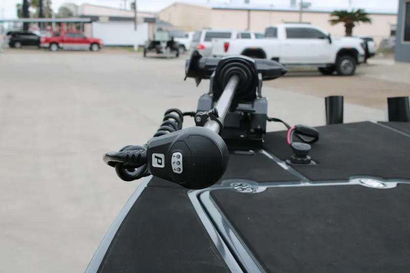 Slide: The Image of Open storage compartment on 2025 Mamba 24 Catamaran Elite boat deck. - 24