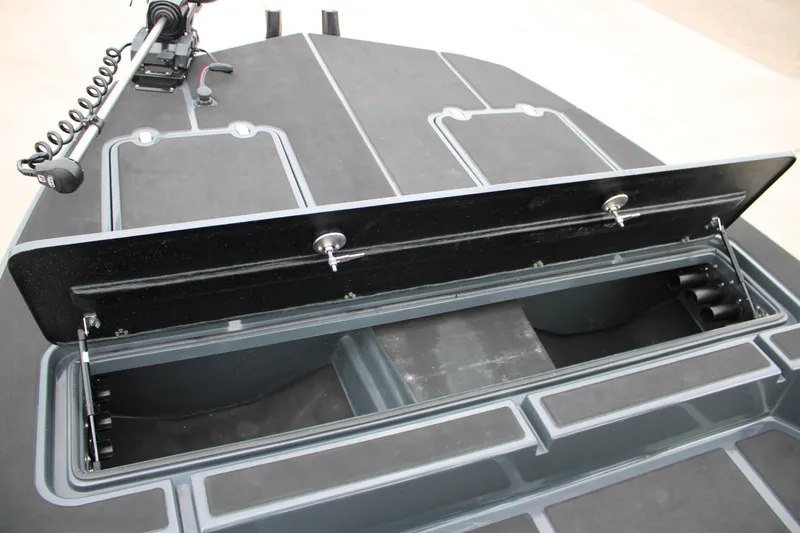 Slide: The Image of 2025 Mamba 24 Catamaran Elite boat interior with sleek black design and sturdy framework. - 25