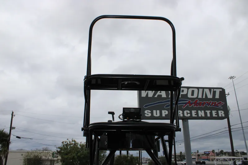 Slide: The Image of 2025 Mamba 24 Catamaran Elite interior with sleek seating and rod holders. - 29