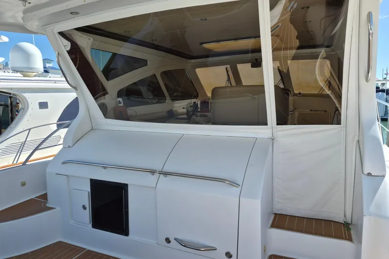 Slide: The Image of 2003 Navigator Californian Veneti yacht interior with sleek white design and modern amenities. - 13