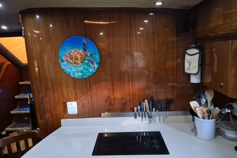 Slide: The Image of Kitchen area in a 2003 Navigator Californian Veneti yacht. - 34