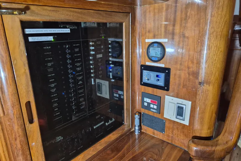 Slide: The Image of Control panel of a 2003 Navigator Californian Veneti yacht with wooden finish. - 38